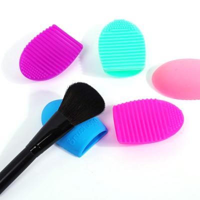 China Eco-friendly Silicone Egg Cleansing Tool Egg Cleansing Face Sweep Egg Finger Held Shape Makeup Brush Egg Shape Makeup Brush for sale