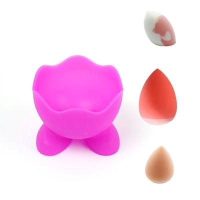 China Eco-friendly Beauty Egg Silicone Makeup Sponge Holder Silicone Powder Blast Egg Bracket Make Up Sponge Holder for sale