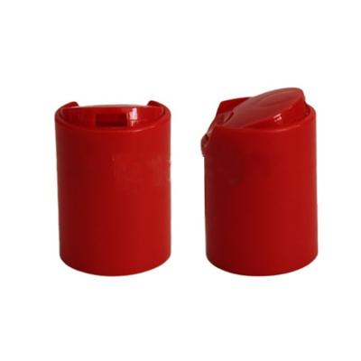 China Non Spill Cosmetics Smooth PP Plastic Red Disc Top Cap 24mm For Bottle for sale