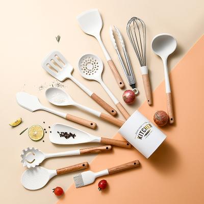 China 12pcs Fun Minimalist Choice Silicone Kitchenware Set High Quality Kitchen Utensils Set With Wooden Handle for sale