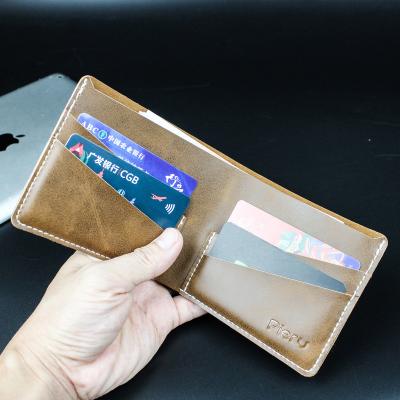 China Pure leather wallet Crazy Horse short men's wallet waterproof simple men's wallet artificial leather anti stain for man goods for sale