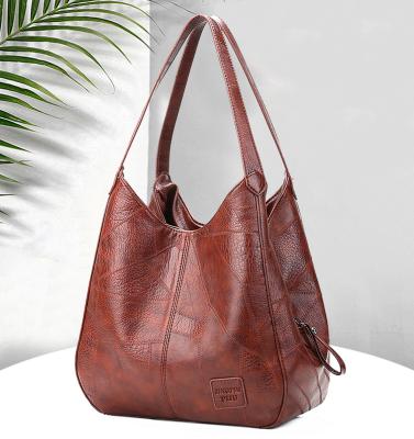 China 2021 fashion new style shoulder handbag soft leather tote bag retro stitching multi-compartment female bag for sale