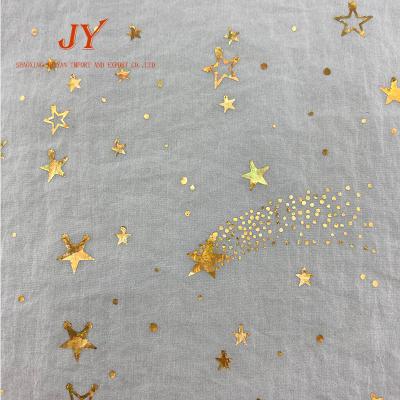 China Memory Stock Gold Luxury Chiffon Printed Fabric Textiles Simple Floral Printed Fabrics for sale