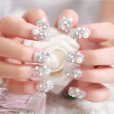 China 24pcs/box Long Lasting Clear Shiny Glitter Designs Fit False Nails Artificial Press On Nails Full Cover Stones Nails for sale