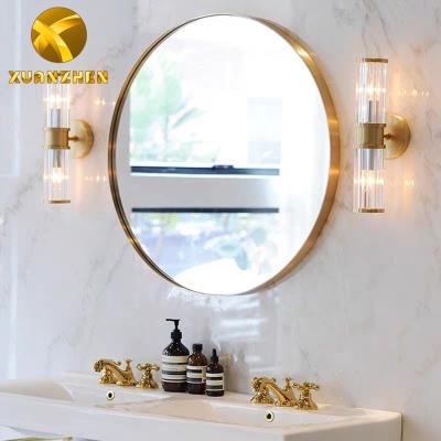 China Modern luxury home furniture gold metal bath mirrors luxury round decor wall mirror stainless steel mirrors for sale for sale