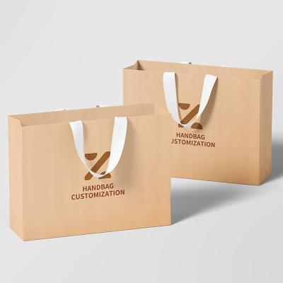 China Custom Recycled Logo Square Bottom Paper Bag Packaging Materials Recyclable Shopping Gift Paper Bags for sale