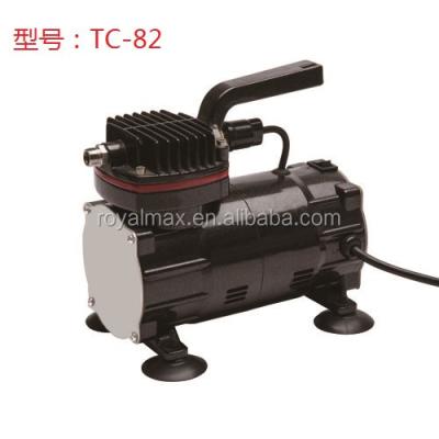 China Royalmax oil free compressor, TC-82 mini handle compressor for painting, tattoo, makeup and scientific research. medical tools for sale