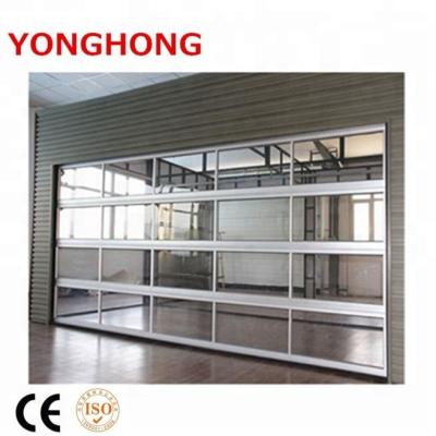 China Automatic Aluminum Glass Security Door And Panel Garage Door Prices for sale