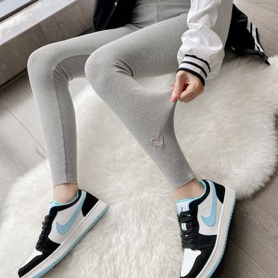 China Anti-wrinkle Gray Threaded Leggings Women Spring slimming pants outer wear waist the high embroidered to stretch tight pants for sale