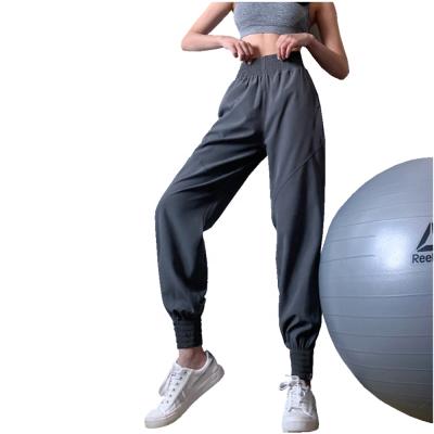 China Breathable Personalized Zipper Ankle Banded Cargo Pants Hip Hop Women Loose Pants Fast Professional Yoga Pants Overall Running Dry for sale