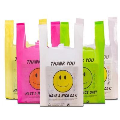 China China Factory Wholesale Heavy Duty Biodegradable Custom Food Grade T-shirt Bag Moisture Proof With Smile Face en venta