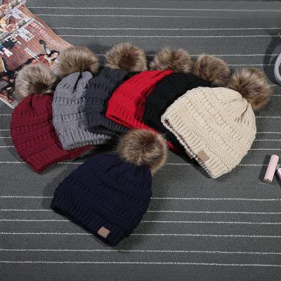 China Custom Sale Plain JOINT Warm Beanie Adult Thick Winter Knit Hats With Pom Pom for sale