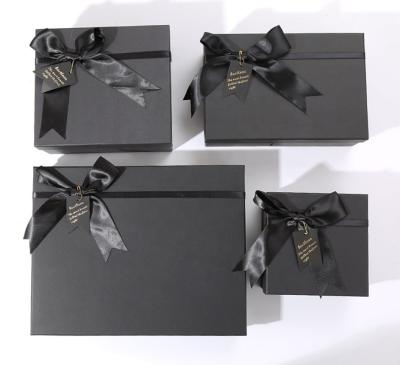 China Recycled Materials Custom Design Luxury Elegant Perfume Packaging Paper Gift Box With Ribbon for sale