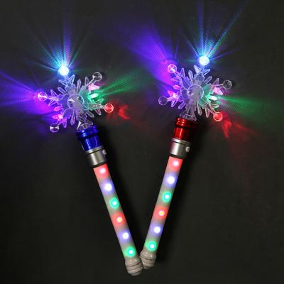 China Christmas Or Other Festival Xmas Kids LED Flashing Light Snowflake Music Bulk Toy LED Multicolor Flashing Flashing Stick for sale