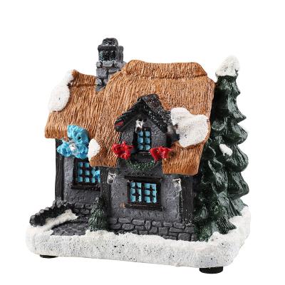 China Durable Christmas Scene Village LED Lighted Snow Decor Miniature Ornaments Winter Resin Open Christmas Village House for sale