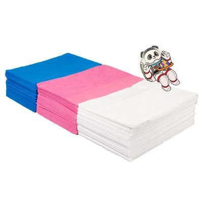 China PVC Folded Sanitary and Comfortable Disposable Bed Sheet for sale