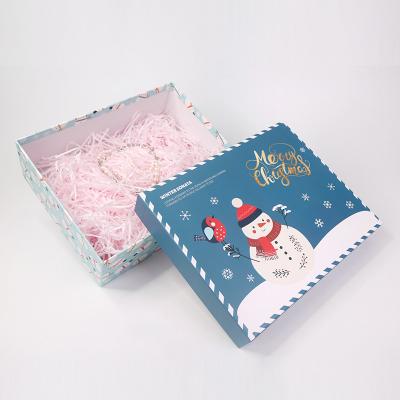 China Recyclable Hot Sale Christmas Cardboard Paper Packaging Blue Snowman Pattern Gift Box For Boys Girls for sale