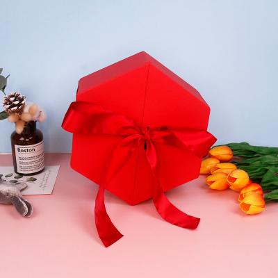 China Handmade Custom Logo Hexagon Red Cardboard Paper Flower Gift Box Packaging with Ribbon for sale