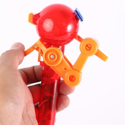 China Plastic & Martian Robot Sucker Lollipop Holder Christmas Gift Candy Tube Toys Hand-pushed Super Fun Plastic New Hot Design Candy 2022 for sale