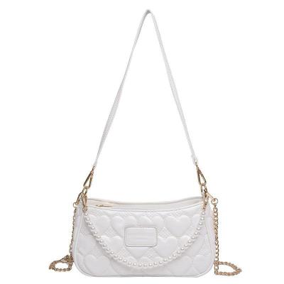 China 2021 high quality pearl handbags women cross - new embroidery body bag chain bagel bag popular textured handbag shoulder armpit bag for sale