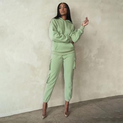 China Wholesale Women Simple Green Pullover Pink Anti-wrinkle White Two Piece Hoodie And Pants Set With Pockets for sale