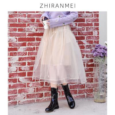 China Long Surrounding Magical Two-Layer Net Red Gauze Skirt Casual And Elegant Skirt Dry Cleaning Striped Gauze Skirt for sale