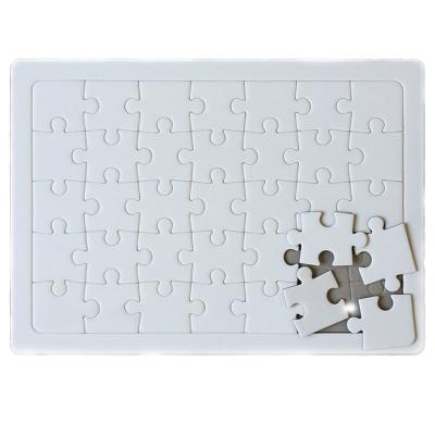 China 100% Eco-friendly Hobby Jigsaw Educational Intellectual Sublimation Holiday Party Pieces Heart Empty Jigsaw Puzzles for sale