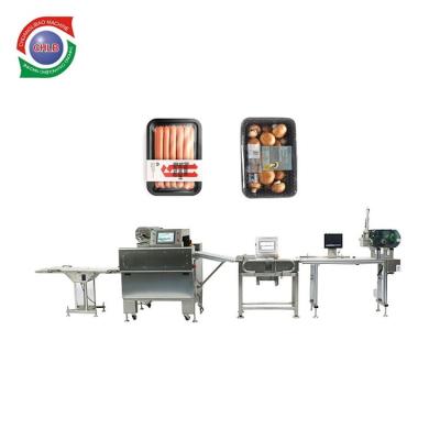 China High Speed ​​Full Automatic Food Cling Film Meat Product Packing Machines For Seafood Meat for sale