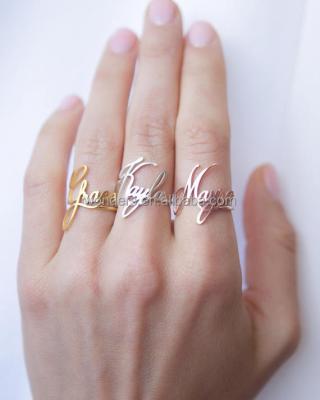 China Trendy Custom Name Couple Stainless Steel Rings For Women Men for sale