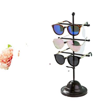 China Decorative Black Metal Eyeglass Eyeglass Sunglasses Show Stand Holder Stand for sale