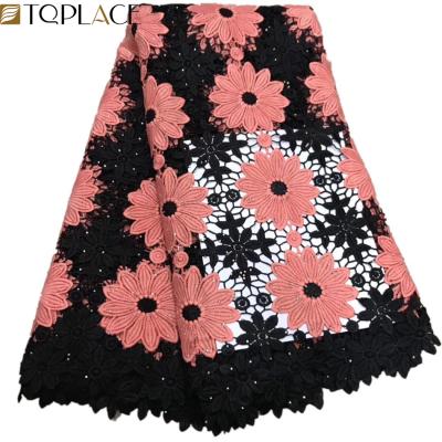 China Viable Peach And Guipure Color Cord Black African Lace Fabric Latest Lace For Dressing for sale