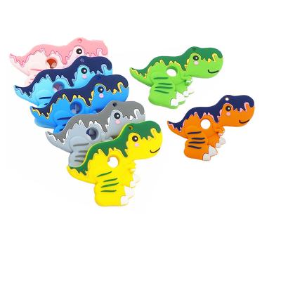 China Food Grade Eco-Friendly Wholesales BPA Free Easy To Hold Custom Baby Candy Color Silicone Tyrannosaurus Rex Teether for sale