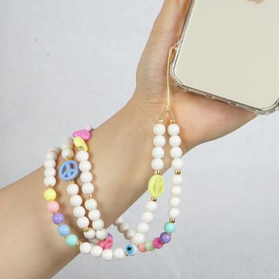 China BOHEMIA Personalized Candy Color Resin Beaded Eye Neck Love Eye Beads Handwoven Cell Phone Chain Long Hanging Cell Phone Strap for sale