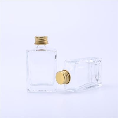 China Personal care square 30ml essential oil glass transparent bottle can be for wine packaging for sale