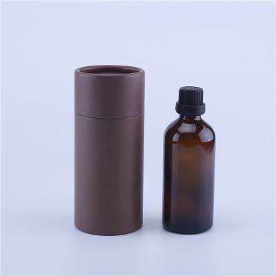 China Personal Care 100ml 50m 30ml 20ml 15ml 10ml 5ml Thick Amber Essential Oil Glass Bottles With Black Cap Glass Containers With Round Paper Tube for sale