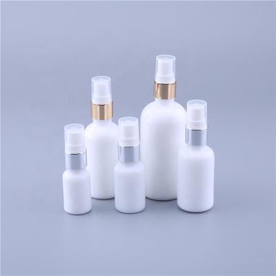 China New Personal Care Cosmetics White Color Glass Spray Bottle 10ml 20ml 30ml 50ml 100ml Perfume Packaging Bottle With Gold Silver Sprayer for sale