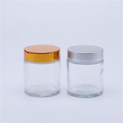 China Hot sale 80g personal care transparent cosmetic glass jar with screw cap lid for face cream container small cosmetic jar glass jar for sale