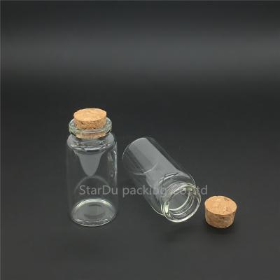 China Personal Care 25ml Clear Glass Tube With Cork Stopper Clasp Cork Bottle 30*60mm Glass Jar for sale