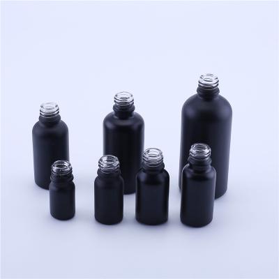 China Personal Care Factory Hot Sale 18mm Neck Matte Black 5ml 10ml 15ml 20ml 30ml 50ml 100ml Essential Oil Glass Bottle for sale