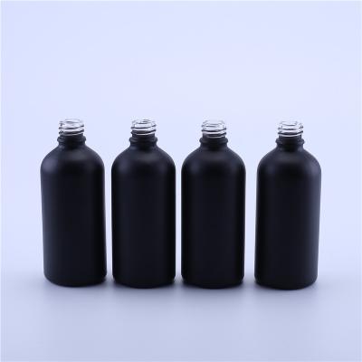 China Personal Care Factory Hot Sale 18mm Neck Empty Perfume And Essential Oil 100ml Matte Black Glass Bottle for sale