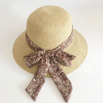 China Good Picture Quality Women Bow Beach Wide Brim Sun Hat Summer Brim Straw Bucket Paper Hat for sale