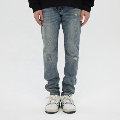 China FMG OEM ODM ripped fashion denim QUICK DRY casual skinny pants ripped tapered pants jeans men for sale