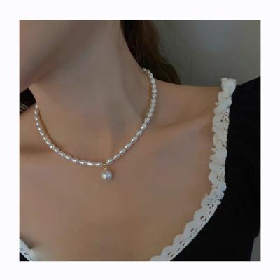 China CLASSIC 5A temperament N003 pendant 5-6mm flexible rice pearl white necklace ladies necklace for sale