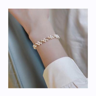 China CLASSIC wholesale trendy unisex natural freshwater B007 3A+ almost round pearl handmade bracelet for sale