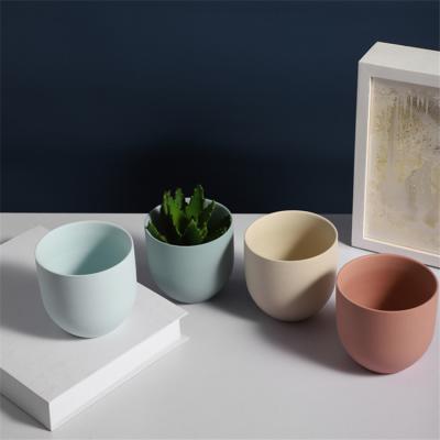 China Wholesale Multi Color Elegant Home Decor Ceramic Planter Cheap Courier Shopping Package Succulent Pot for sale