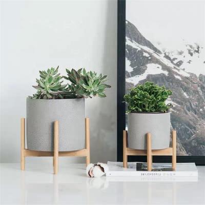 China Elegant Modern Style Frosting Cylindrical Planter / Wooden Stand Outdoor Clay Planters For Succulents for sale