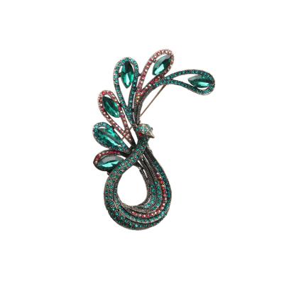 China Animal Peacock Crystal Brooch For Women Colorful Artificial New Design Fabric Decoration for sale