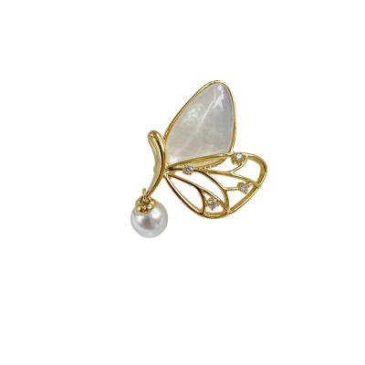 China Hot Sale Cloth Decoration Shell Wing Hollow Pearl Dangle Butterfly Alloy Brooch Jewelry for sale