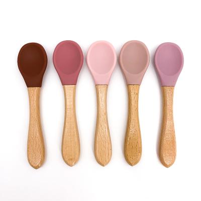 China BPA Free Custom Logo Wooden Handle Spoon Wood Silicone Baby Food Grade Feeding Spoon For Bowl for sale