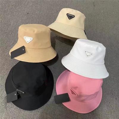 China Hot Fashion Mens Fisherman Hat Trendy Breathable Metal Inverted Triangle Logo P Logo Black Nylon Luxury Hats For Women for sale